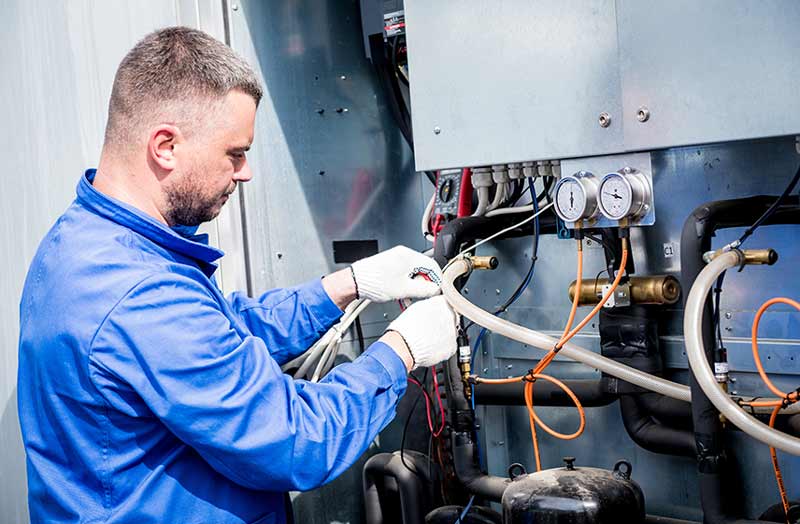 Employee doing a maintenance check