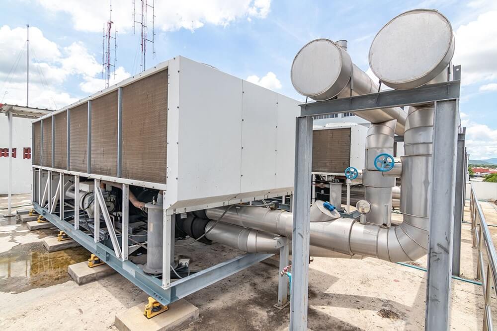 Air-cooled commercial chiller unit showing signs that may require professional chiller repair