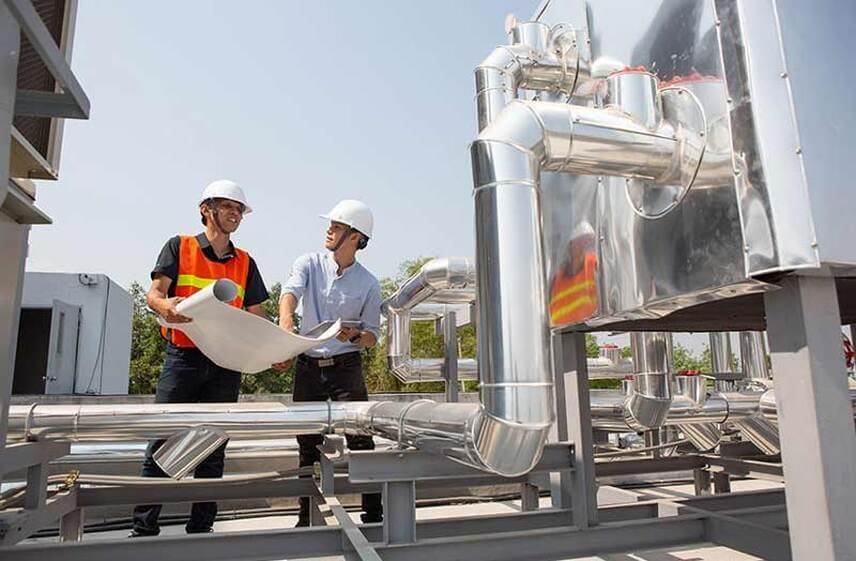 Engineers reviewing plans as part of top-quality commercial HVAC company services in North Carolina