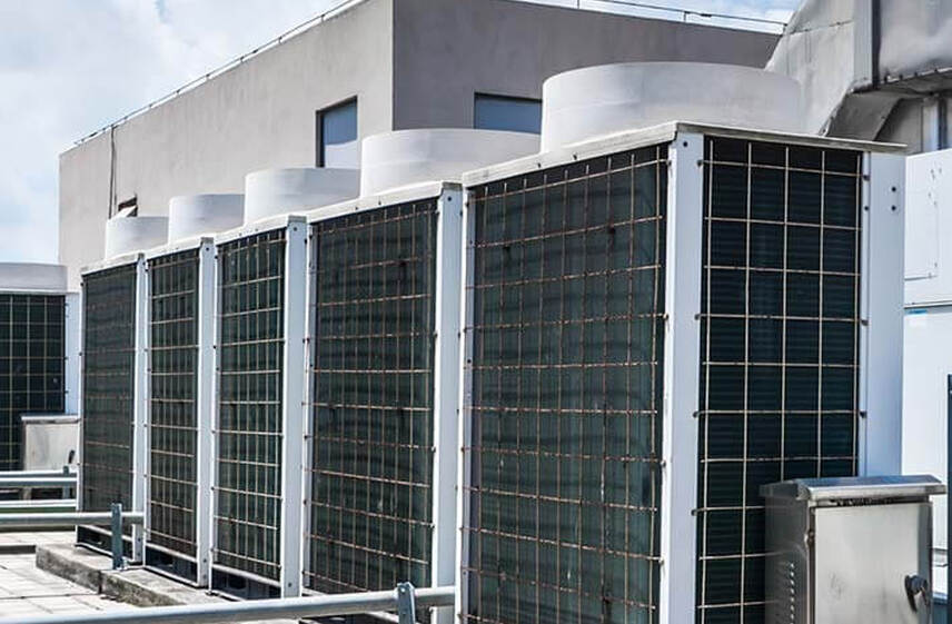 Rooftop condensing units serviced by certified commercial HVAC contractors in NC